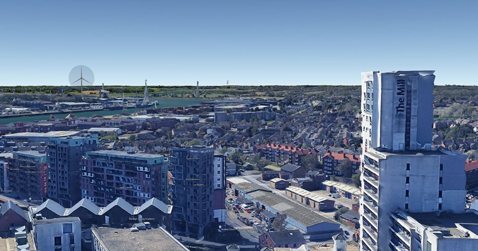 View over the Waterfront: The Mill in the foreground, the proposed turbine on the horizon. Google Earth, indicative only.